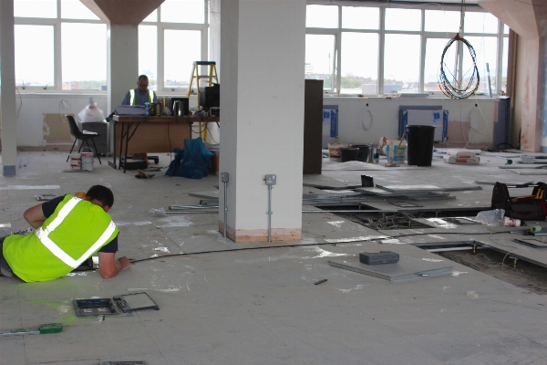 Man working structure floor Photo