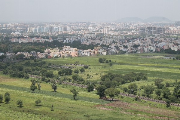 Landscape field hill city Photo