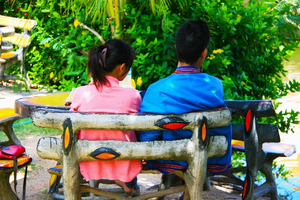 Man people woman bench Photo