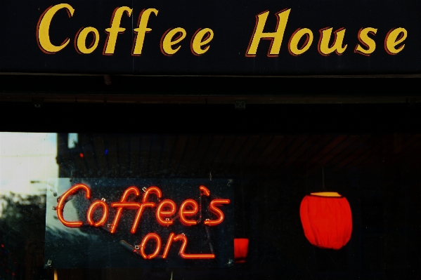 Coffee shop night advertising sign Photo