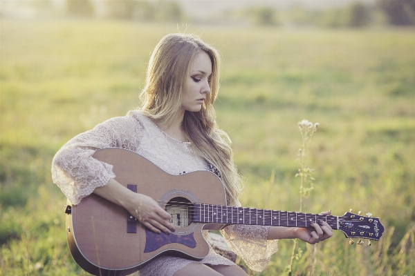 Grass person music girl Photo