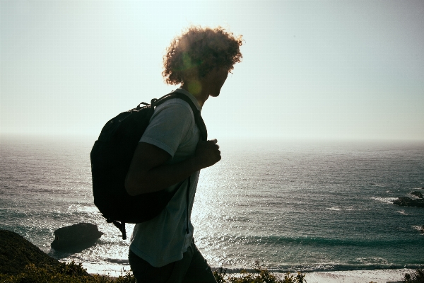 Man beach sea coast Photo