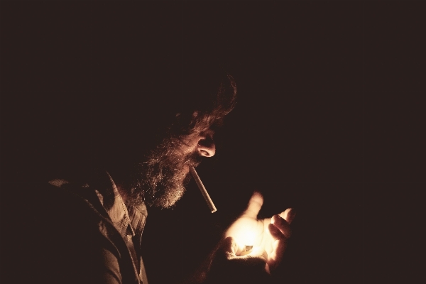 Man light night smoking Photo