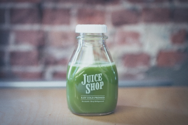 Green produce drink bottle Photo