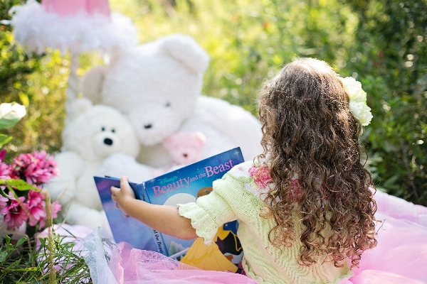 Book girl flower reading Photo