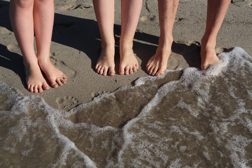 Hand beach sea water