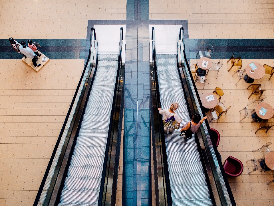 Man people escalator transport