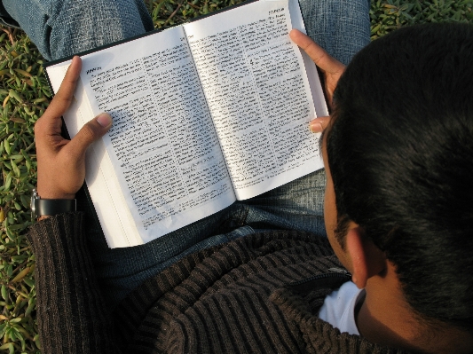 Writing person reading religion Photo