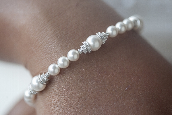 Woman white material bracelet Photo