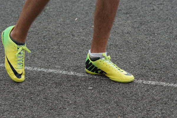 Person shoe running asphalt Photo