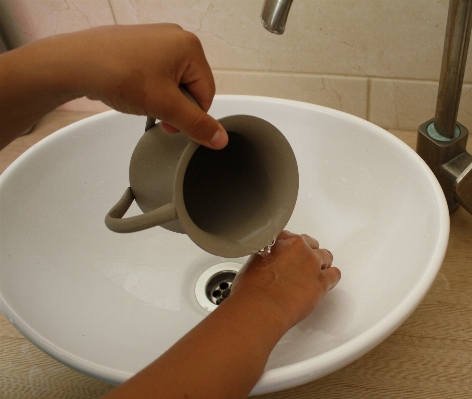 Hand water food ceramic Photo