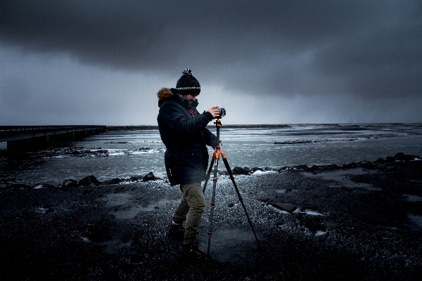 Work man sea coast Photo