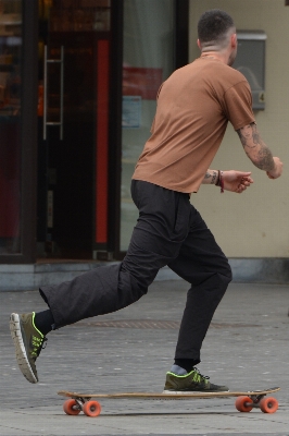 Man people skateboard skateboarding Photo