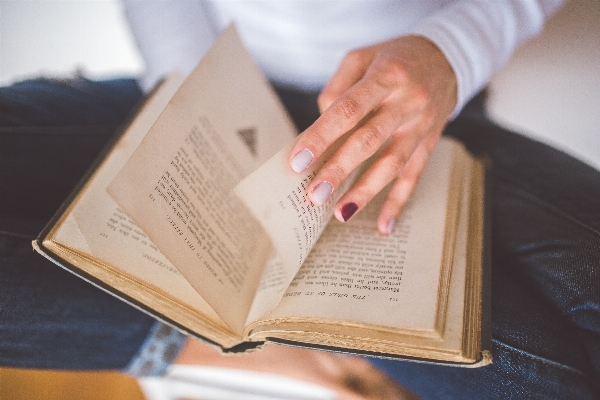 Writing hand book girl Photo