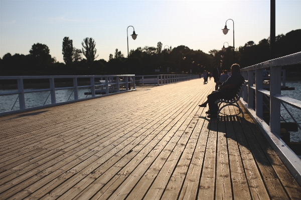 Man sea water boardwalk Photo