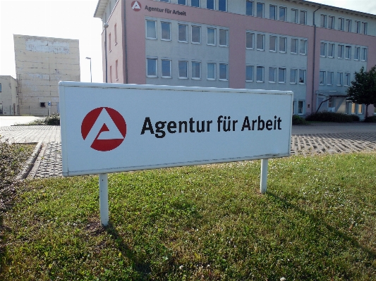 Work advertising sign street Photo