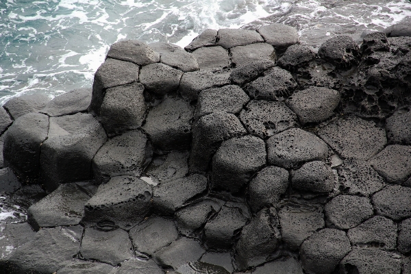 Rock black and white texture cobblestone Photo