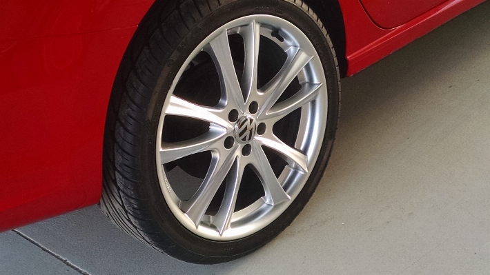 Car wheel red vehicle Photo