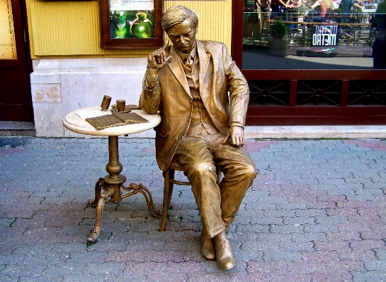 Street monument statue sitting Photo