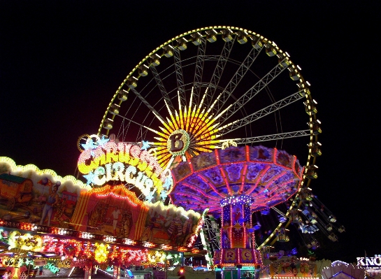 Night recreation ferris wheel amusement park Photo