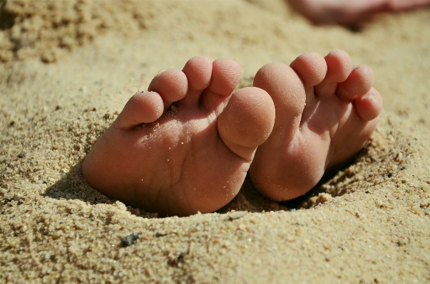 Hand beach sand feet Photo