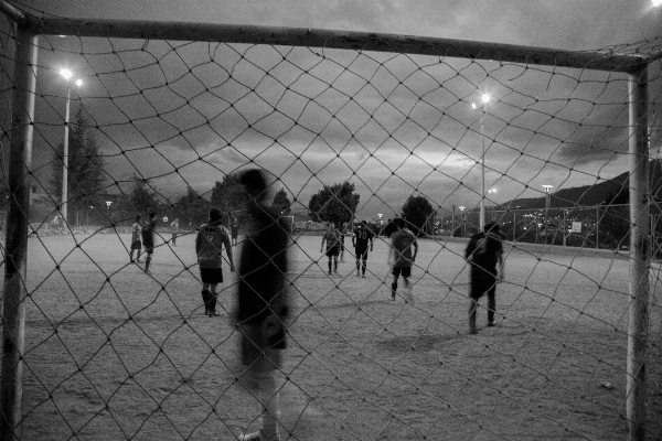 Photo Noir et blanc
 personnes jeu football