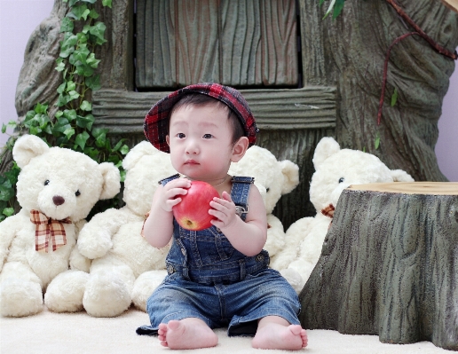 Apple boy asian sitting Photo