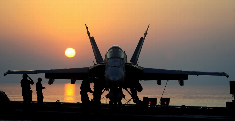 Water sky sunset airplane Photo