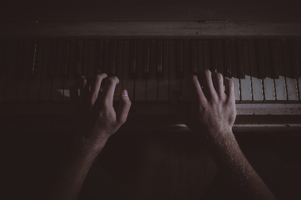 Hand music light black and white Photo