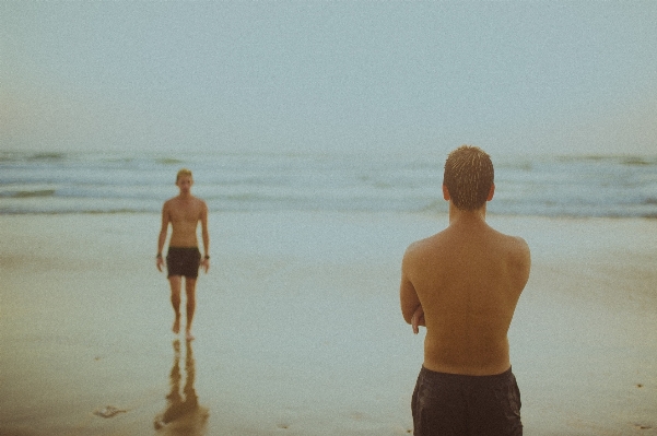 Man beach sea sand Photo