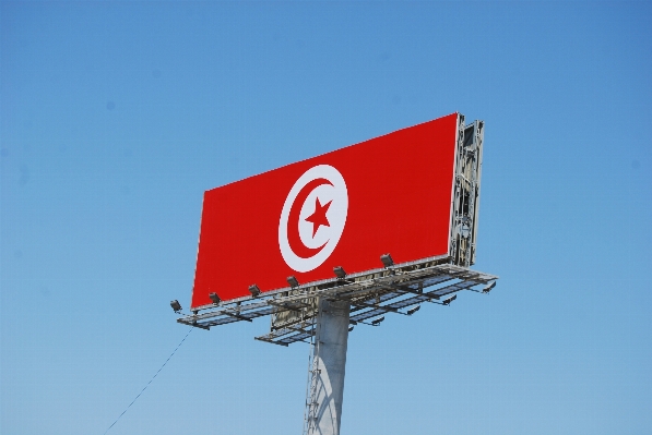 Sky advertising sign red Photo