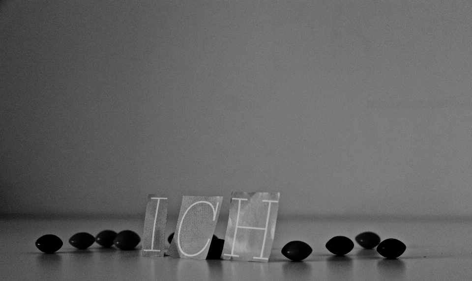 Black and white glass letters