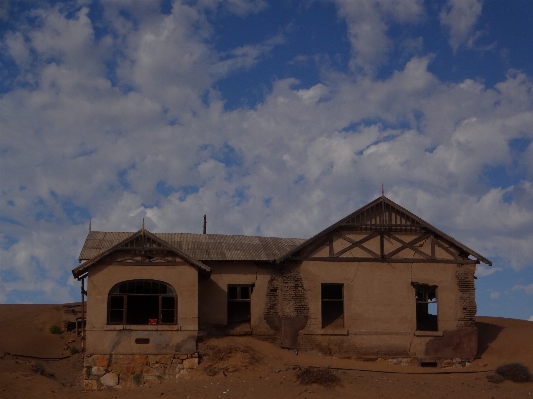 Landscape sand sky house Photo