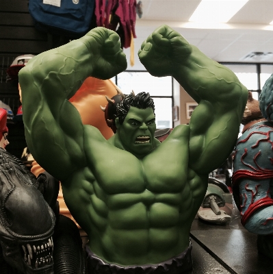 Statue green toy muscular Photo