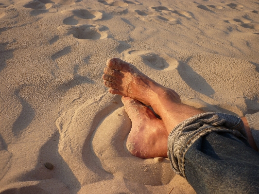 Hand beach sea sand Photo