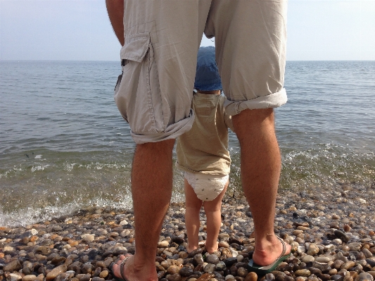 Man beach sea sand Photo