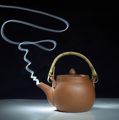 Steam tea teapot smoking Photo