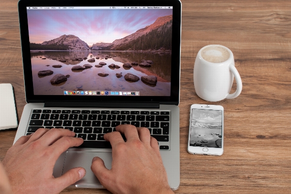 Laptop iphone desk notebook Photo