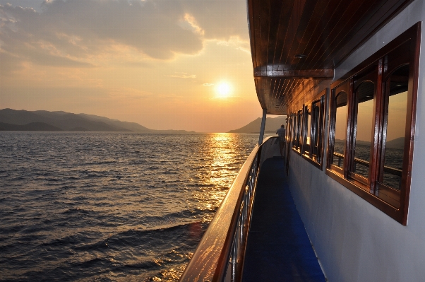 Sea ocean sunset boat Photo