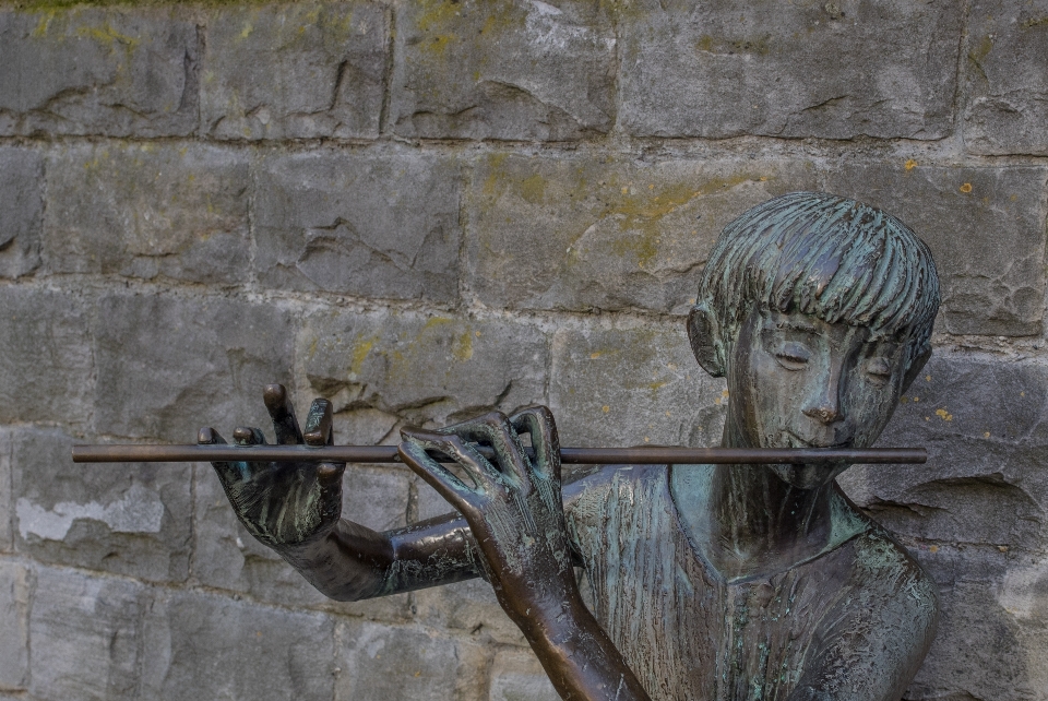 Musique jouer mur statue