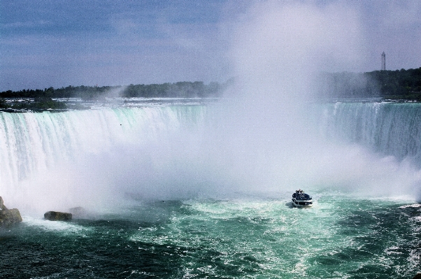 Sea water waterfall boat Photo