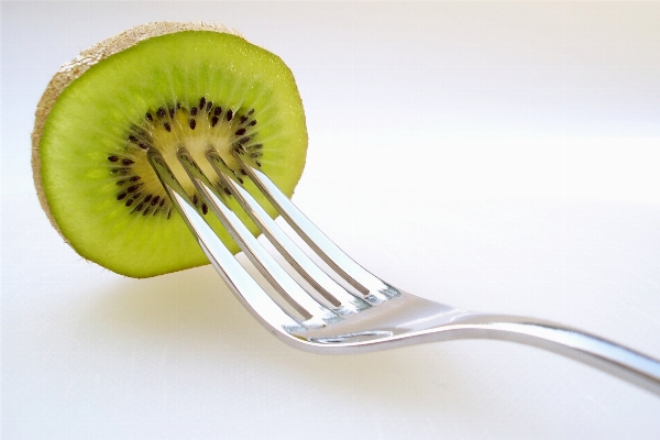 Foto Garpu alat makan buah makanan