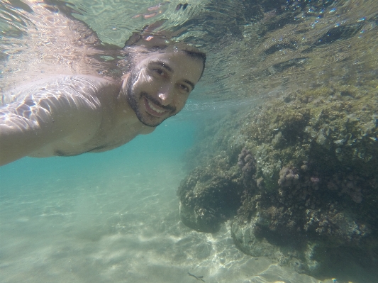 Sea water sand rock Photo