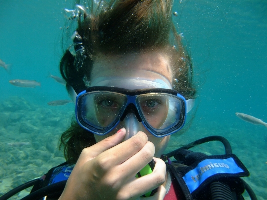 Woman recreation diving underwater Photo