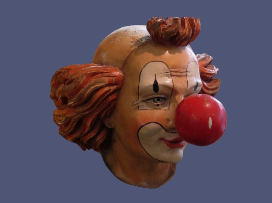 Human body clown face sculpture Photo