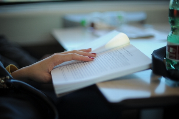 Writing hand water book Photo