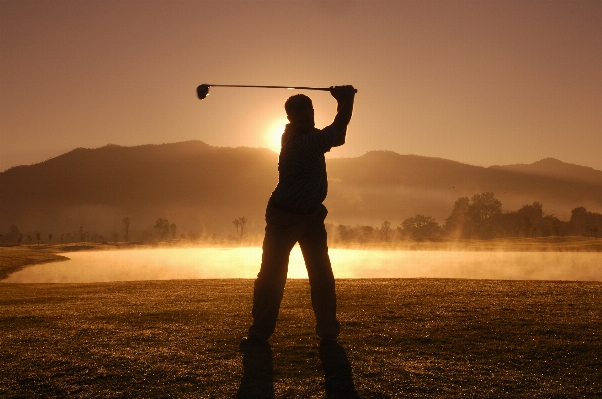 Man horizon silhouette sun Photo