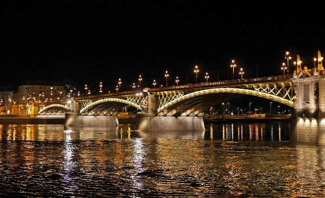 Foto água ponte noite aceno