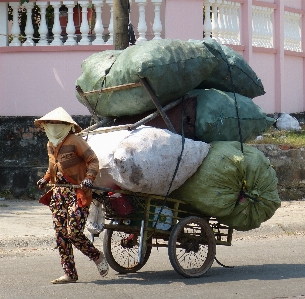 Woman cart plastic monument Photo