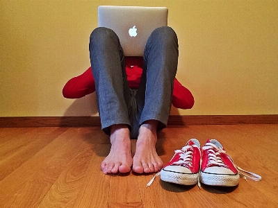 Laptop person shoe leg Photo